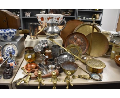 A mixed collection of brass, copper and silver plated items including four graduated shelf frogs, a hunting horn possibly for