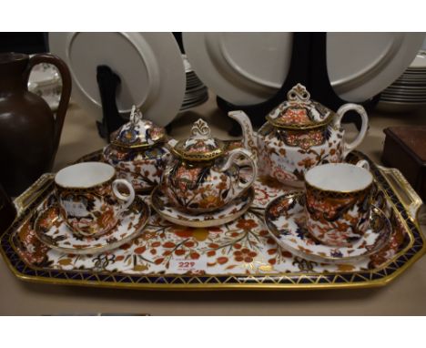 A Victorian Crown Derby porcelain nine piece breakfast set to include canted rectangular tray with integral moulded handles, 