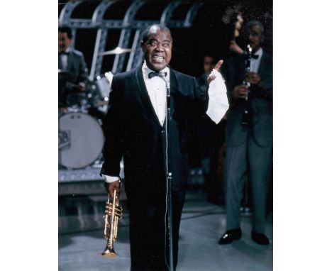 Louis Armstrong signed Ticket And Photo. Superb item! This is a 1959 orchestra ticket signed on the reverse by the legendary 