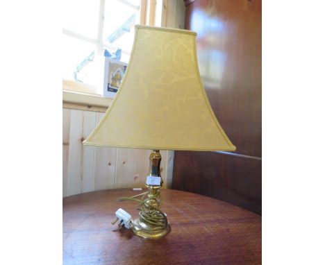 A TRADITIONAL BRASS TABLE LAMP WITH SHADE
