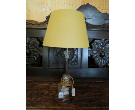 A SILVER PLATED CORINTHIAN COLUMN TABLE LAMP AND SHADE