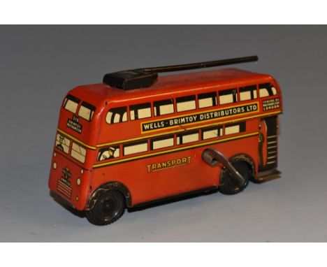 Wells Brimtoy Distributors Ltd  - a clockwork London double decker trolley bus. , AWW516, 112mm long, with key