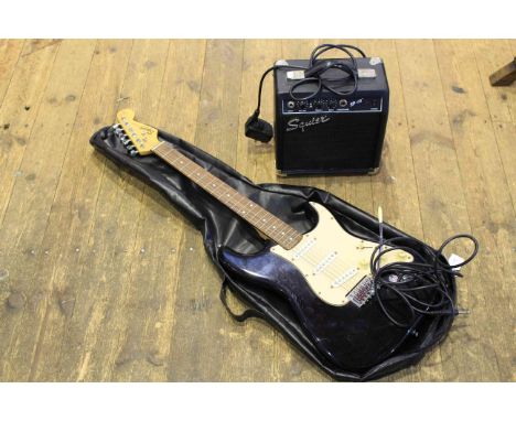 Electric guitar and Squier amplifier