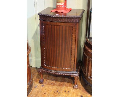 Mahogany Chippendale style bow front music cabinet on ball and claw legs