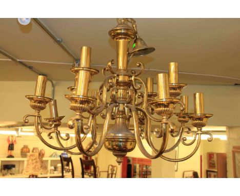 Twelve branch gilt metal light fitting and nine wall lights