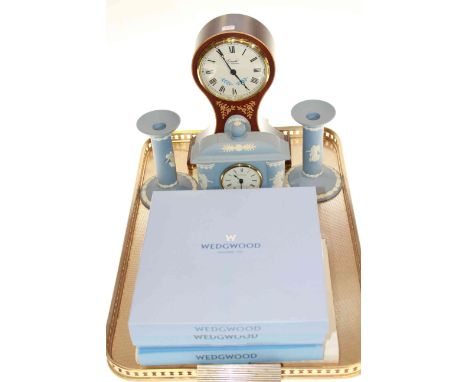 Wedgwood mantel clock and candlesticks, mounted balloon clock and five boxed anniversary plates