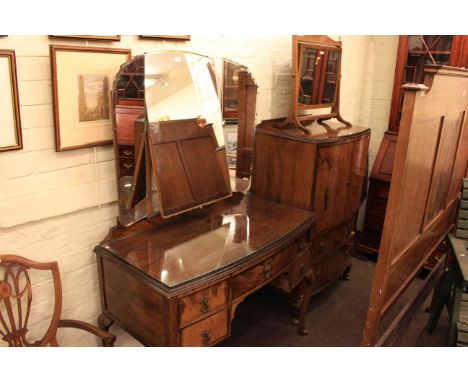 Walnut bow front dressing table, linen chest, pair of headboards and mahogany and satinwood inlaid toilet mirror (5)