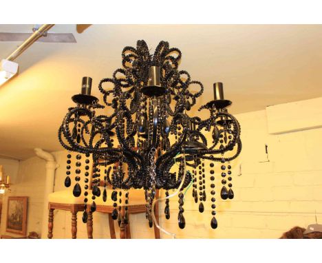 Eight branch decorative black glass light fitting