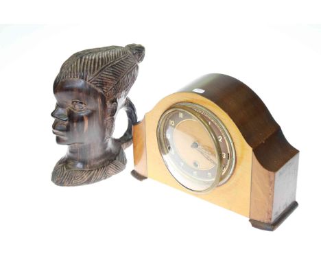 Ethnic carved bust and 1950's mantel clock