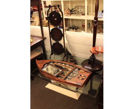 Glass topped low centre table, three tier folding cakestand, standard lamp and shade, framed nautical plaque and mirror namep