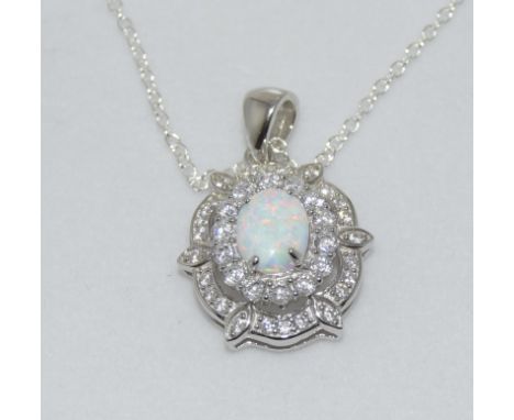 Silver and cz pendant with large inset opal