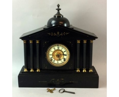 Ornate slate mantle clock with keys