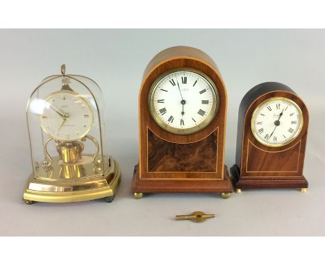 Mahogany dome shape inlaid mantle clock with key and another similar , together  a Lynze cased anniversary clock