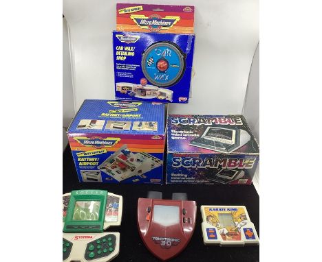 Micro Machines toys by Galoob c vintage 1989 to include a boxed airport and a car wash &nbsp;a scramble &nbsp;electronic spac