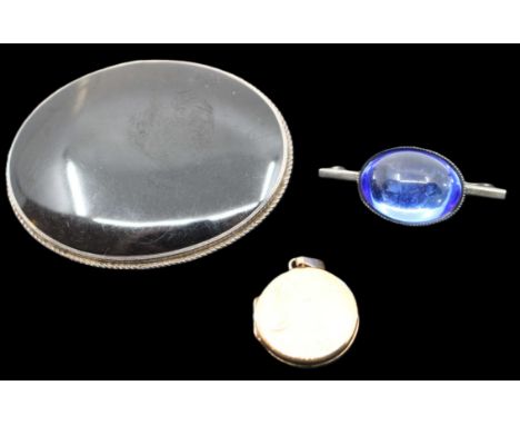A 9ct gold circular locket, diameter approx 17mm, weight approx 2.5gms, along with a jade type gilt metal bangle, width appro