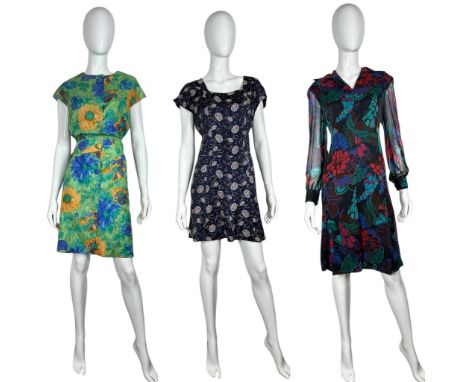 A group of 1960s dresses to include one in a floral silk chiffon, a baby blue rain satin mini dress, the cloth embroidered wi