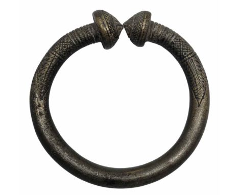 An African bronze tribal arm bangle / currency bangle. late 19th early 20th century. 12 cm diameter.