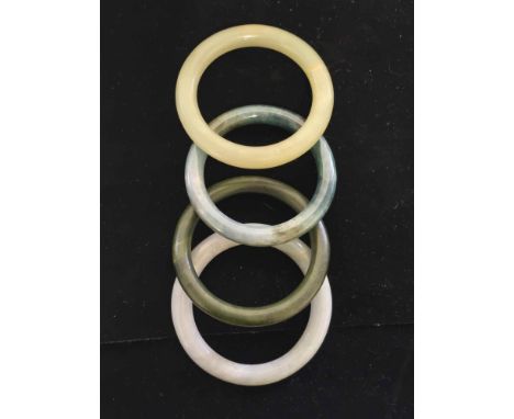 ***RE-OFFER IN OUR MARCH SALE AT &pound;40-&pound;60***




A collection of four Jade Bangles various colours.
8cmdiameter 6c