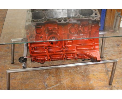 Small glass top engine block coffee table (this item is home made and will require finishing)