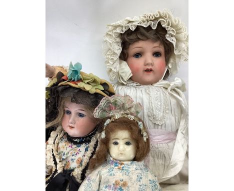 Antique German dolls group;,toys to include a 25&rdquo; German HW bisque head doll in antique clothes , a further AM 370 shou