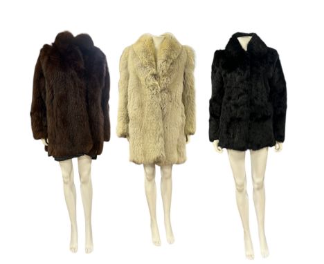 four vintage fur jackets to include a mahogany Saga Fox, a longer length marbled fox, a palomino musquash and a black rabbit 