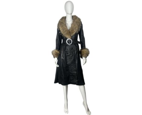 A black leather coat by Baccarat C1970s with fox fur collar and cuffs and a black acetate lining. The coat has a double breas