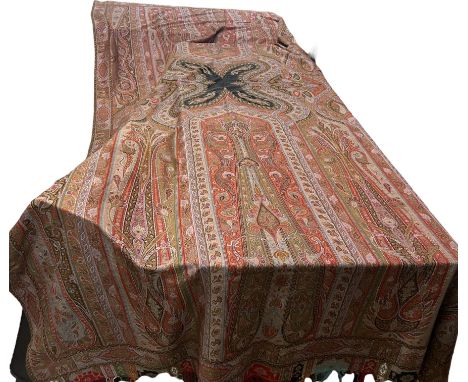 Two mid to late 19th century shawls, one with traditional paisley/ boteh motifs in the Kashmiri style, probably French and wo