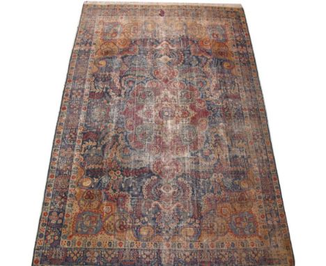 A large and very old Iranian carpet with repairs. Main colour blue. 390X285cm. Μεγάλο Περσικό παλιό χαλί σε μπλε χρώμα.
Inhou