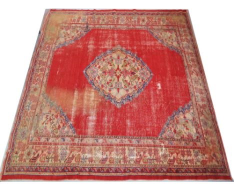 A large and very old Iranian carpet in poor condition. Main colour red. 360X370cm. 
Μεγάλο Περσικό παλιό χαλί σε κόκκινο χρώμ