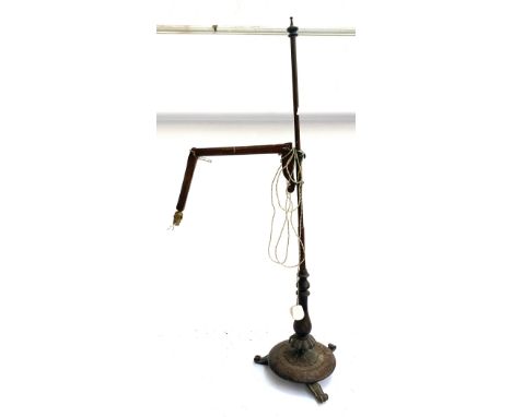 An unusual opposable adjustable lamp, converted from a fire screen pole 