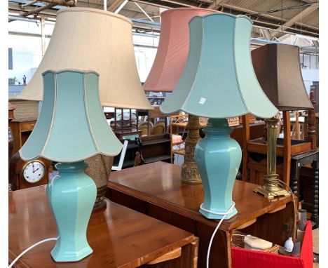 A graduating pair of ceramic table lamps; together with three others 