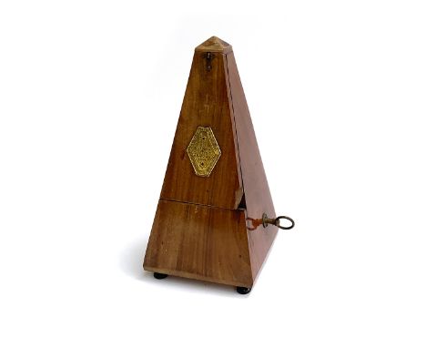 A mechanical metronome marked Maelzel Paris 