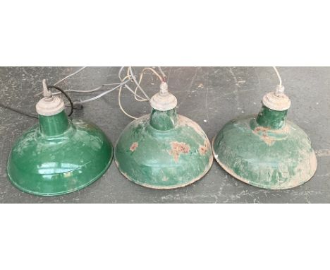 A lot of three vintage green enamel industrial lightshades, each 41cmD 