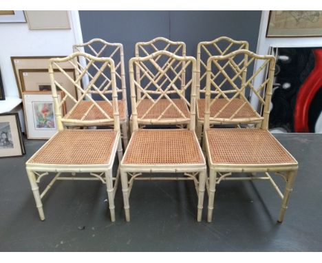 A good set of six Chinese Chippendale style white painted faux bamboo occasional chairs, with lattice back over caned seats a