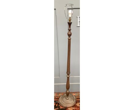 A mahogany turned wood standard lamp, 170cmH 