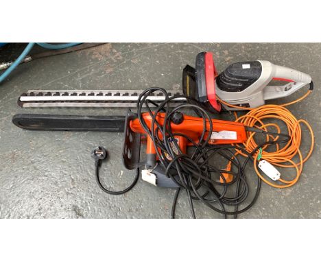 A Castor hi-tech E1.6 electric chainsaw; together with a Spear &amp; Jackson electric hedge trimmer 
