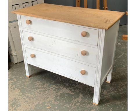 A small white painted chest of three drawers, the top light oak, 91x44x75cmH 