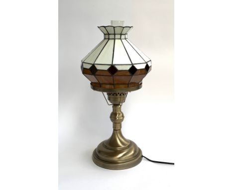 A modern table lamp with Tiffany style shade and glass chimney, 52cmH 