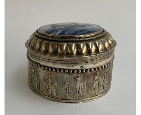 A continental silver lidded pot, with blue and white Delft ceramic windmill to top, 9cmD 