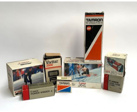 A mixed lot of boxed vintage photographic equipment, to include Canon A-1, Tamron 70-210mm F3.5-4 zoom lens; Canon 50mm F1.5 