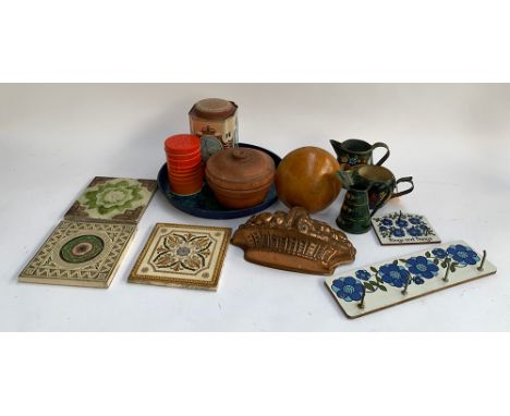 A mixed lot to include bargeware jugs, enamel tray, large darning mushroom, silver jubilee tin tea caddy, glazed tiles etc 