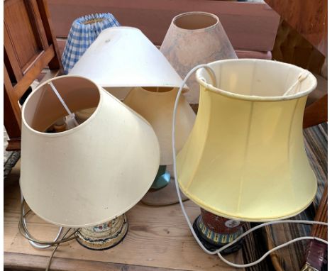 A mixed lot of seven table lamps, mostly ceramic, with shades 