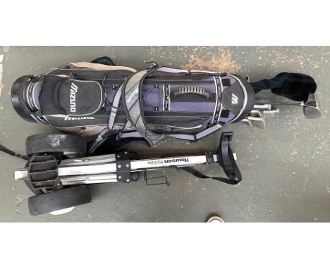 A set of Mizuno golf clubs in bag, with caddy trolley 