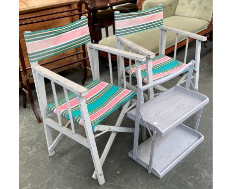 A pair of folding grey painted deck chairs; together with a folding double shelf, 54cmW 