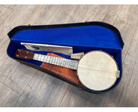 A vintage banjo ukulele (banjolele), cased 