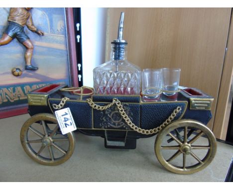 MUSICAL DECANTER IN THE FORM OF A CARRIAGE