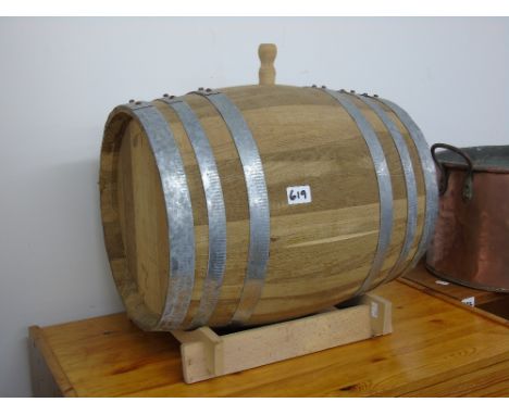 WOODEN BARREL ON STAND
