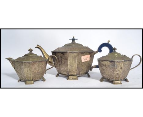 A 19th century Chinese silver plate three piece tea service consisting of tea pot , sugar pot and creamer milk jug. Decorated