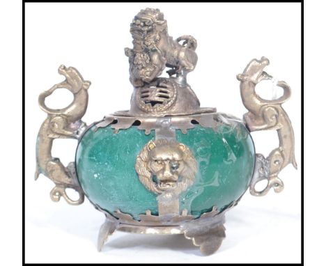 An early 20th century silver plated&nbsp; incense pot of bulbous form having a green jade type stone body with silver plated 