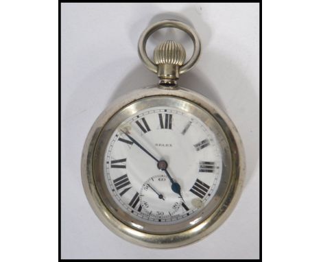 A vintage early 20th century LNER 7929 open faced, keyless wind pocket watch, over stamped three times EX BR SELEX, white ena